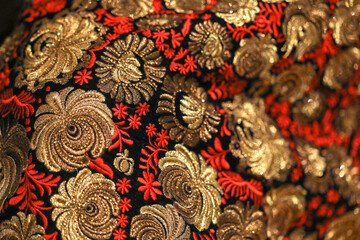 red and gold work on skirt