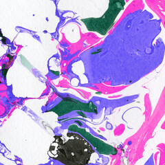 Colorful marble ink texture on watercolor paper background. Marble stone image. Bath bomb effect. Psychedelic biomorphic art.