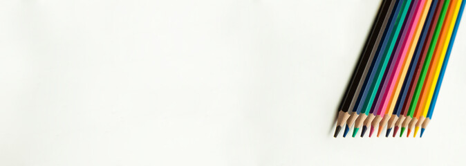 colored pencils on a white background. education concept. illustration of training.