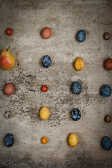 assortment of Easter dyed eggs on shabby vintage background, festive gift card