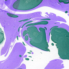 Colorful marble ink texture on watercolor paper background. Marble stone image. Bath bomb effect. Psychedelic biomorphic art.