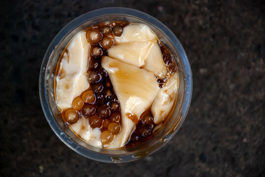 Sweetened delicacy soft soy curd locally known in the Philippines  as taho