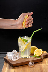 Fresh cocktail with lemon and soda water