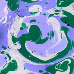 Colorful marble ink texture on watercolor paper background. Marble stone image. Bath bomb effect. Psychedelic biomorphic art.