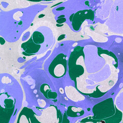 Fototapeta na wymiar Colorful marble ink texture on watercolor paper background. Marble stone image. Bath bomb effect. Psychedelic biomorphic art.