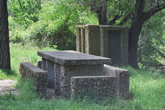 Stone picnic table and seating architecture in the countryside