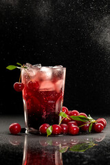 Summer fresh cocktail with soda and syrup and cherry