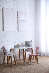 Baby room interior with toys and stylish furniture