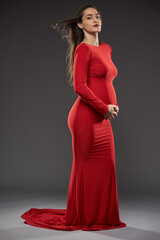 Gorgeous pregnant lady in red dress