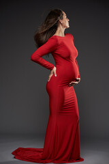 Gorgeous pregnant lady in red dress