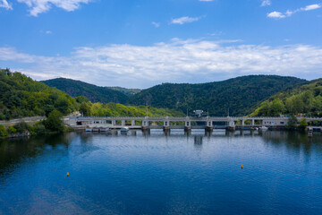 Fototapeta na wymiar Slapy dam on Vltava river. Water reservoir and famous tourist place in Czech republic, European Unio. Photo taken with a drone.