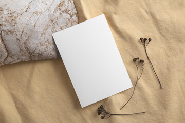 Invitation card on piece of wood. Mock-up