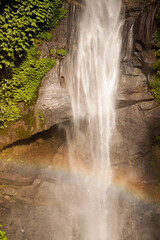A close-up of a beautiful rainbow over Sekumpul Waterfall in Bali  © EceNaz
