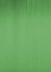 Green ink and watercolor texture on white paper background. Gradient paint strokes and decalcomania effect. Hand-painted gouache abstract image. Mess on the canvas.
