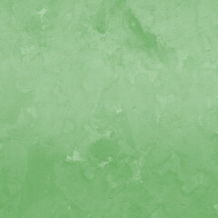 Green ink and watercolor texture on white paper background. Gradient paint strokes and decalcomania effect. Hand-painted gouache abstract image. Mess on the canvas.