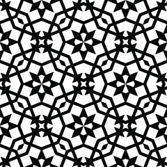  Geometric vector pattern with triangular elements. Seamless abstract ornament for wallpapers and backgrounds. Black and white colors.