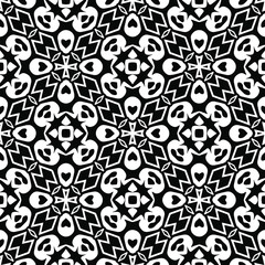 Geometric vector pattern with triangular elements. Seamless abstract ornament for wallpapers and backgrounds. Black and white colors.
