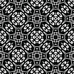  Geometric vector pattern with triangular elements. Seamless abstract ornament for wallpapers and backgrounds. Black and white colors.