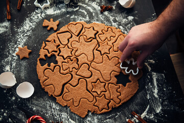 Cooking homemade gingerbread cookies. Traditional homemade Christmas pastries.
