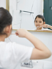 girl brushing teeth
