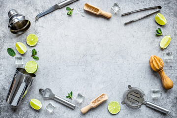 Flat lay frame of bar accessories and ingredients for mojito cocktail