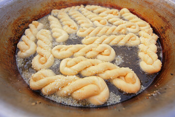 Mahua, a traditional Chinese food is fried in oil, North China