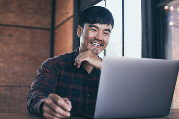 asian man work using computer hand typing laptop keyboard contact us.student study learning education online.adult professional people chatting search at office.concept for technology device business