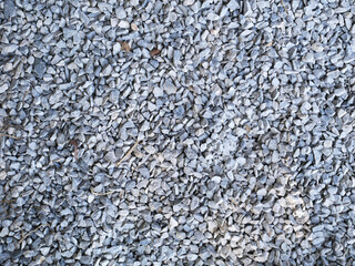 Crushed gravel as background or texture. Background of granite gravel