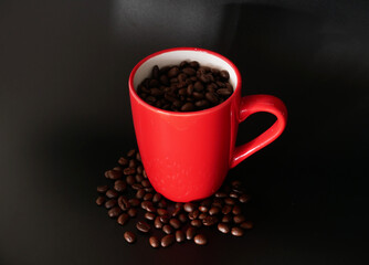 Black coffee cup on background with Coffee beans