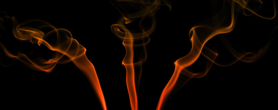 Collection Swirling Movement Of Orange Smoke Group, Abstract Line Isolated On Black Background