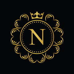 Fototapeta premium Golden Letter N. template logo Luxury gold letter with crown. Monogram alphabet . Beautiful royal initials letter.