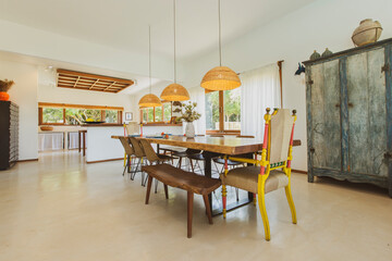 Modern summer holiday or vacation wooden beach house living room interior with rustic luxury sofas, tables and decoration. 