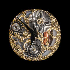 Dial with embossed decorations in gold and silver with black pointer