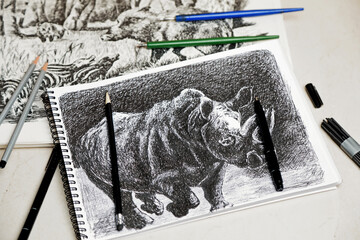 black and white illustration of a rhino