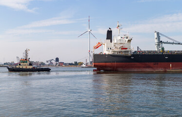 Harbor tug and cargo ship