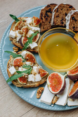 bread slicing plate honey cheese figs decorated