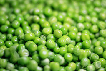 fresh green peas background texture top view. Healthy lifestyle. Proper nutrition