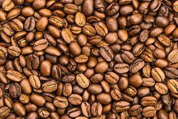 Top view pile of coffee beans on the floor.