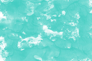 Aqua ink and watercolor texture on white paper background. Paint leaks and decalcomania effects. Hand-painted gouache abstract image. Mess on the canvas.