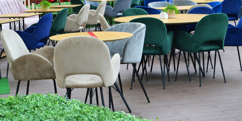 Tables and chairs in an empty cafe. Covid