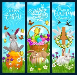 Happy Easter vector banners with cartoon bunnies sitting and sleeping on painted eggs on green meadow. Flower wreath hang on cross and basket with blossoms. Easter holidays celebration postcards