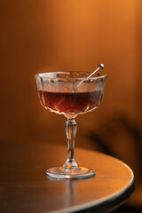 aperitif cocktail with decorations, boy with drink