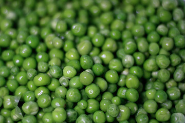 Green pea. Green background. Pea background. View from above. Healthy lifestyle. Proper nutrition