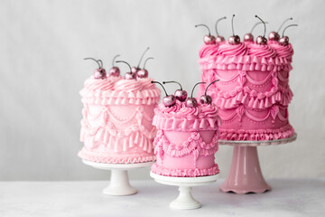 Three vintage piped buttercream birthday cakes