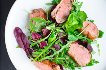 duck breast salad mix green lettuce leaves portion on the table healthy meal snack outdoor top view copy space for text food background rustic image 