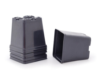 Black plastic flower pots.