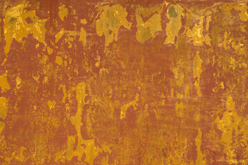 Cracked paint layers on a metal surface. Peeling paint forms bizarre shapes. Texture of the old rusty painted metal. Metallic texture.