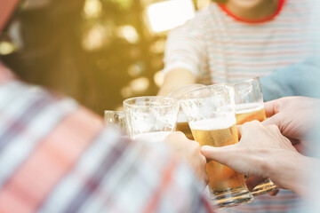 Happy group of friends drinking and drinking beer at the beer bar Christmas celebration.The concept of friendship