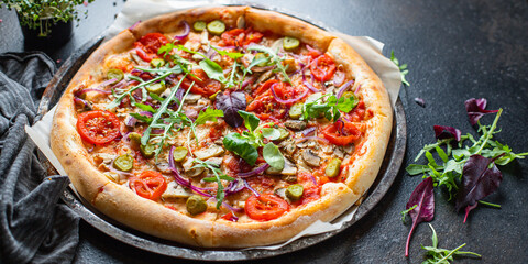 vegetable pizza tomato, onion, pickles, mushrooms vegan or vegetarian no meat portion on the table healthy meal snack outdoor top view copy space food background rustic 