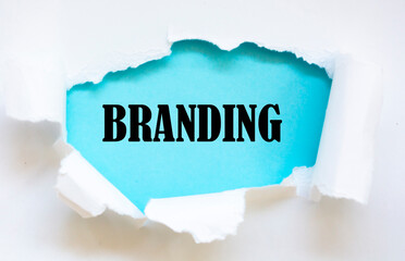 Torn paper with word branding